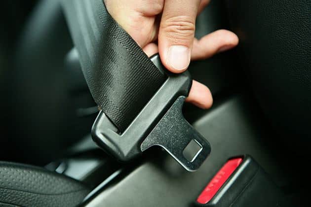 Who invented the seat belt and why?
