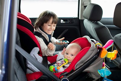 when to put toys on car seat