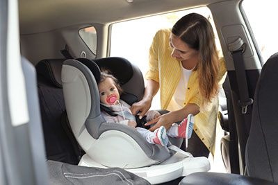 can you swaddle baby in car seat